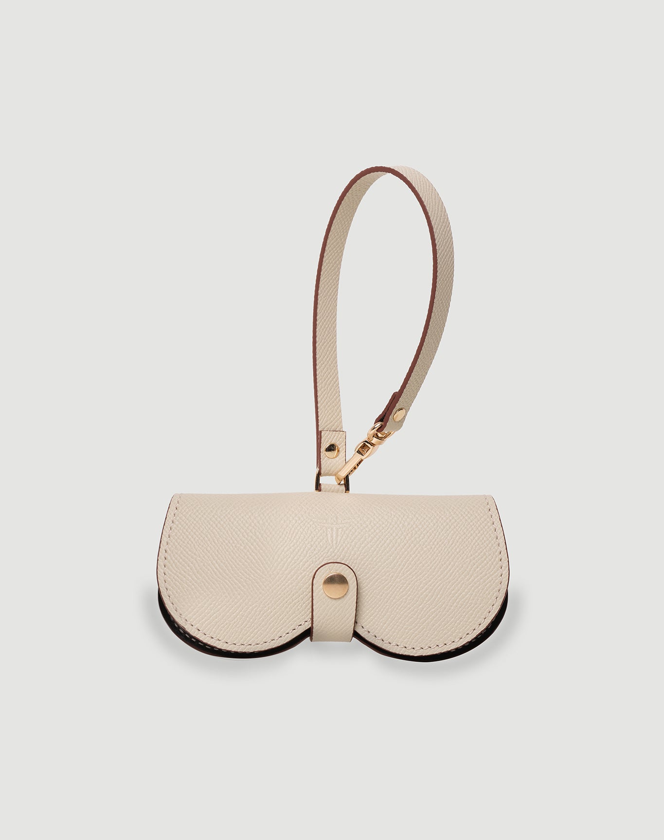 Bej renkli FOHM deri gözlük kılıfı, yuvarlak formda ve kayış detaylı