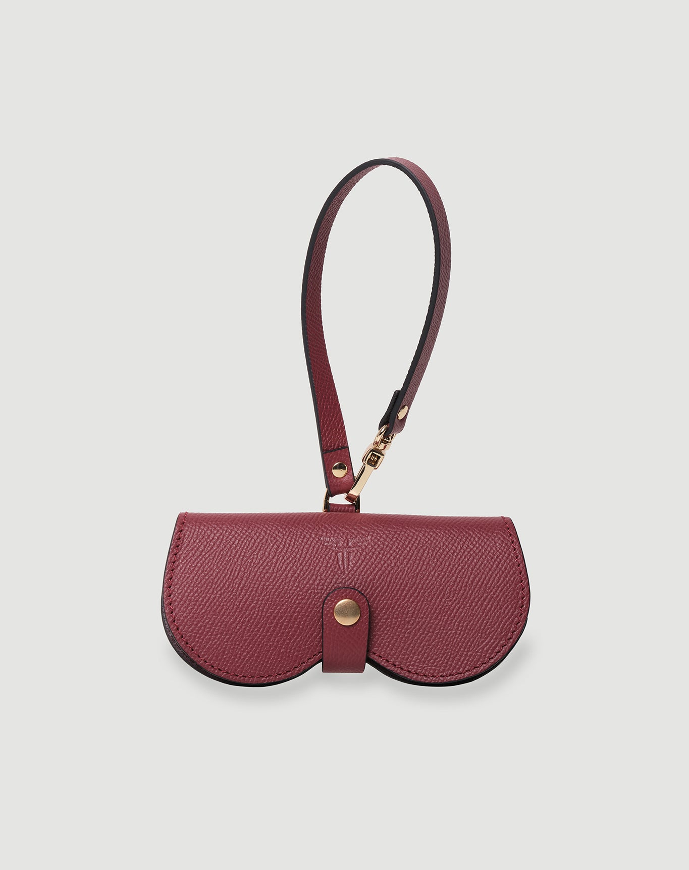 Bordo renkli FOHM deri gözlük kılıfı, şık ve sağlam tasarım.