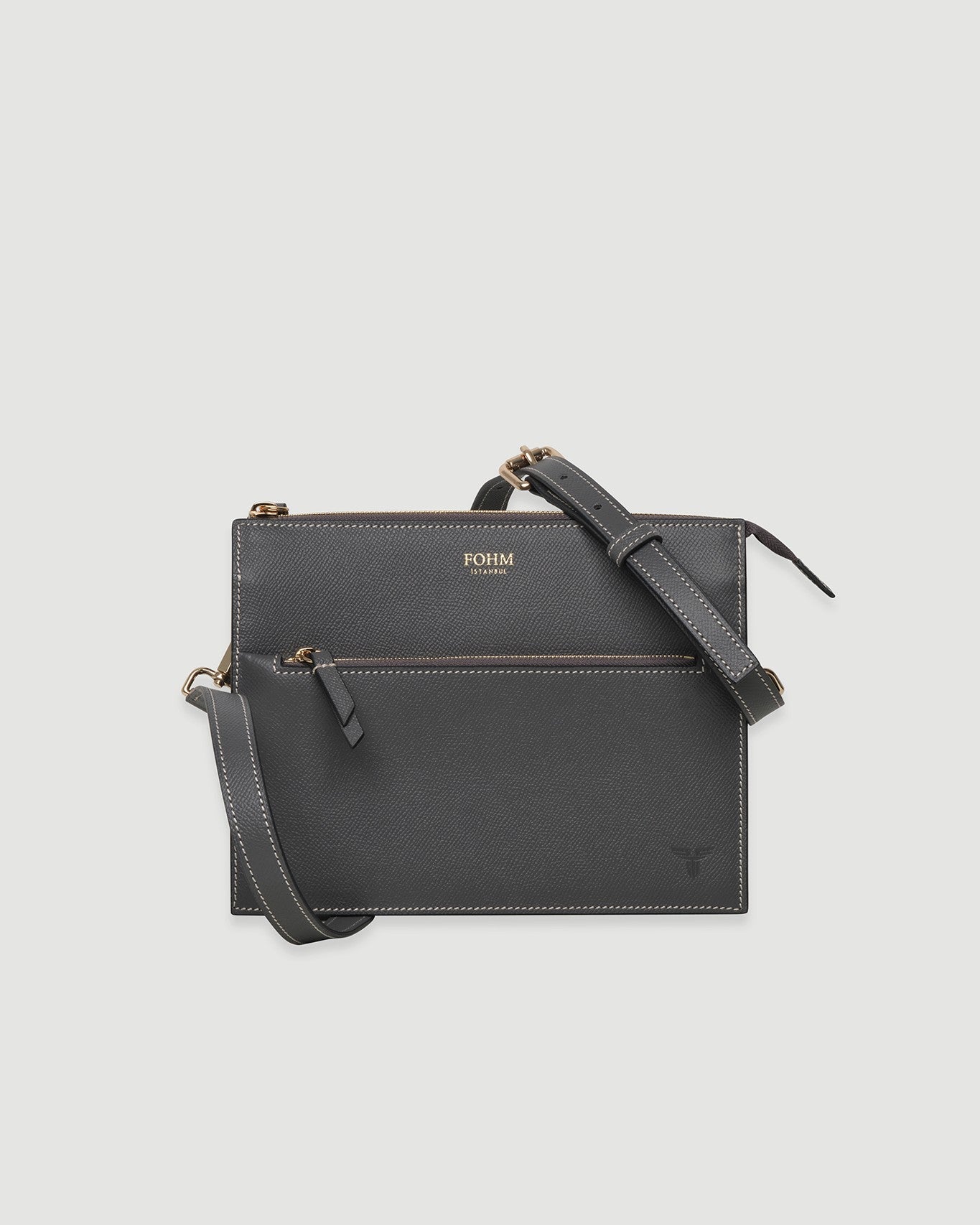 Koyu gri, dikdörtgen formda FOHM deri çanta, altın detaylı ve çapraz askılı tasarım