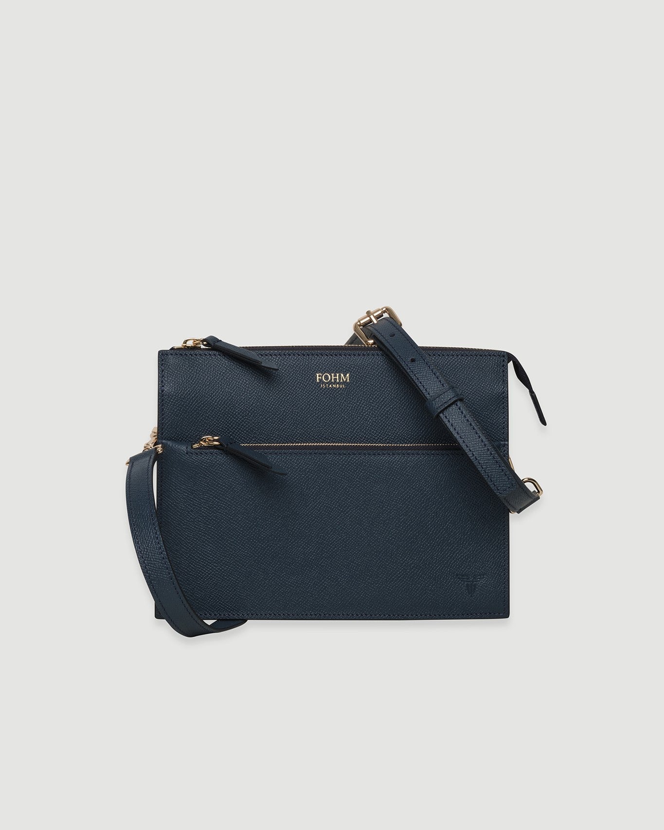 FOHM lacivert deri kadın çanta, altın detaylı, dikdörtgen formda, ayarlanabilir askılı